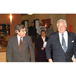 Senator Edward Kennedy and President Richard Freeland arrive for a press conference on student financial aid cuts