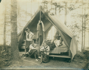 Girls resting in their tent, Denmark, Maine, undated