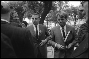 Robert F. Kennedy, walking away from the podium after speaking on behalf of Democratic candidates in front of the Noble County courthouse (Walter Mondale at left)