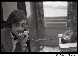 Boston University News staff: Raymond Mungo on the telephone