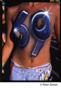 Woman with '69' sprayed on in body paint