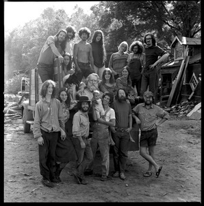 Packer Corners commune members and friends posed with a statue on the commune truck, Maybelline