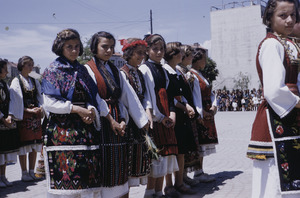 Closeup of folk dancers at national celebration