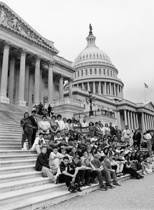 Congressman John W. Olver (right) with group of visitors from Athol Middle School, posed on the steps of the United States Capitol building