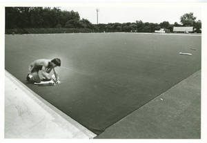 John Mentor covering Benedum Field with new turf (1978)