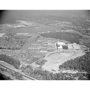 Suburban location of industrial buildings, some new construction, unidentified