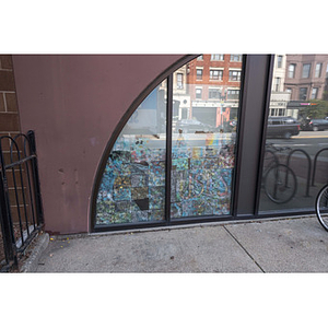 Harriet Tubman House lunette window on Columbus Avenue, left