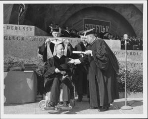 Former Boston Mayor John F. Collins receives an honorary degree at the 1962 Suffolk University commencement