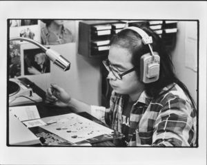 Steve Seto, a student deejay at Suffolk University Radio Station (WSFR), 1975