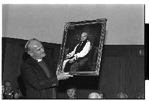Archbishop Robin Eames Primate of Ireland, Church of Ireland admires his portrait (painting) when presented to him in Downpatrick Cathedral