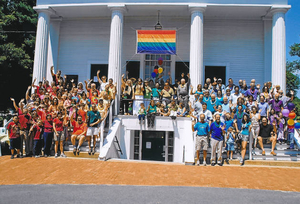 A human rainbow on the steps of the Unitarian Church of Sharon