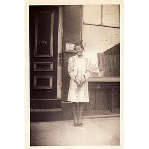 Phyllis stands in front of a dentist's office on Tremont Street
