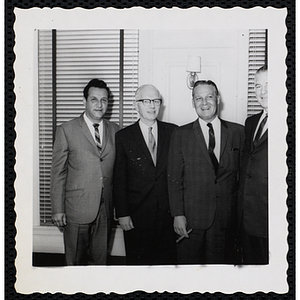 Board of Overseers members, including William J. Lynch, standing third from left