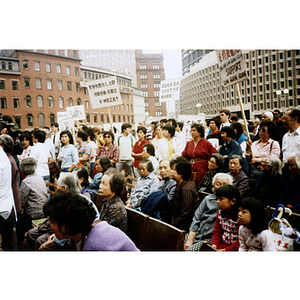 Chinese American demonstrators and concerned citizens at a rally for Long Guang Huang in City Hall Plaza in Boston