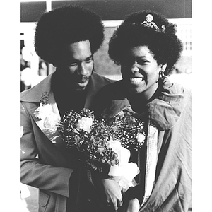 Homecoming Queen Robin Claiborne stands with a male