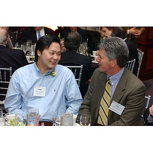 Victor Tong and Phil Cunningham converse at The National Council Dinner