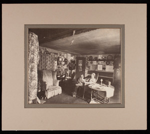 Bill Stear's room at Quincy, Mass. about 1900. Bill in chair.