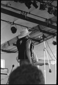 Taj Mahal (from behind) taking the stage at the Newport Folk Festival