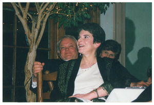 Sidney Lipshires' friend, Jan Bendall, watching a speaker at a dinner event