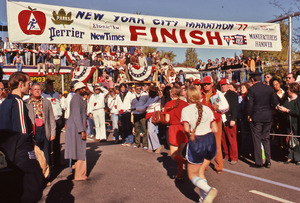 Female marathon runners approaching the finish line