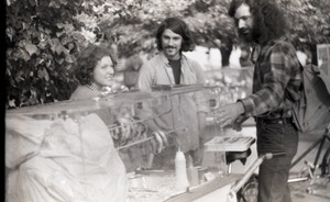Purchasing pretzels from a street cart, possibly in Springfield