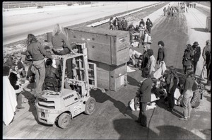 Hollywood Speedway Rock Festival: using forklift to move concert equipment