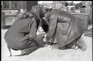 Hollywood Speedway Rock Festival: stage crew working on electrical outlets