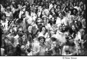Ram Dass lecture in Boston: double-exposed lecture audience