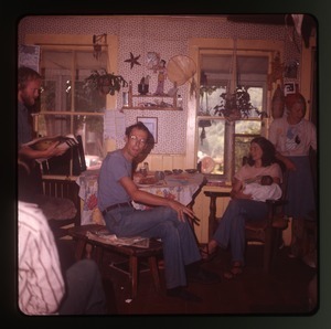 Dan Keller, Nina Keller, and others in the kitchen at Montague Farm Commune