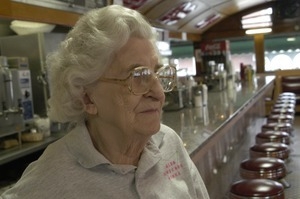 Waitress standing by the counter, Miss Florence Diner