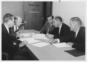 Joseph S. Marcus in a meeting