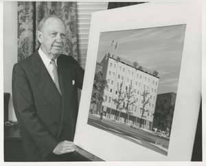 Jeremiah Milbank Sr. presenting an illustration of prospective building plans