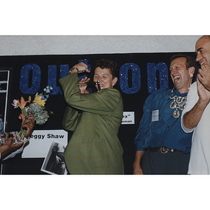 Peggy Shaw receiving an award at an "Out on the Edge 6" event