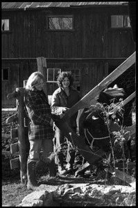 Janice Frey (left) and Nina Keller with cow, Montague Farm commune