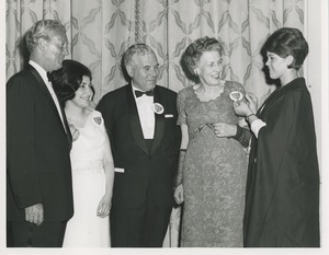 Attendees wearing pins at project diadem dinner