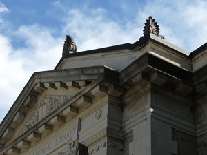 Griswold Memorial Library: detail of pediment and ornaments above front door