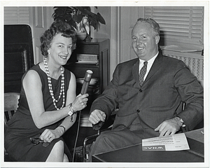 Mayor John F. Collins with an unidentified woman holding a microphone