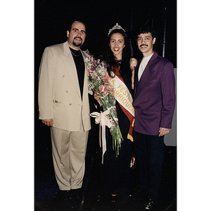 Yaritza Gonzalez, Miss Festival Puertorriqueño 1996, poses with two men