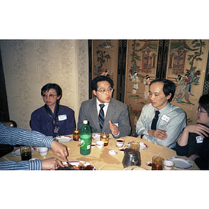 Men and women attend a celebration of the Lunar New Year hosted by the Chinese Progressive Association