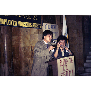 Speaker and Suzanne Lee at an unemployment insurance rally