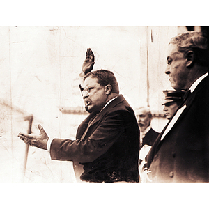 President Theodore Roosevelt gesturing and speaking at the Boston Public Library Arena