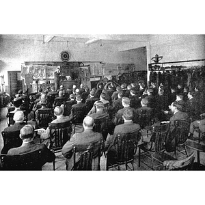 Male students sit in a classroom