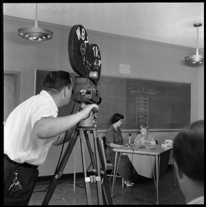Yankee Atomic: WBZ cameraman filming a teacher and child seated at a desk