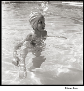 Carly Simon with swim cap in pool