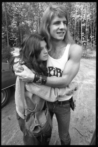 Michael Metelica embracing an unidentified woman in front of the Warwick dormitory, Brotherhood of the Spirit commune