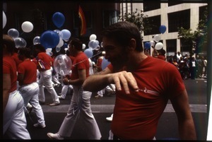 San Francisco Gay Men's Chorus marching with balloons in the San Francisco Pride Parade