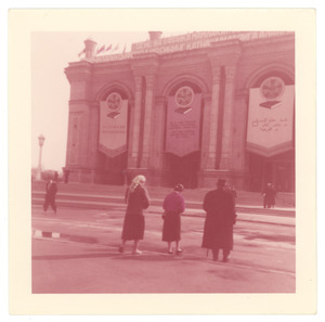 W. E. B. Du Bois and two unidentified women walking towards the Alisher Navoi Opera and Ballet Theatre in Tashkent