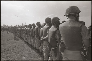 Antiwar demonstration at Fort Dix, N.J.: line of military police with gas masks