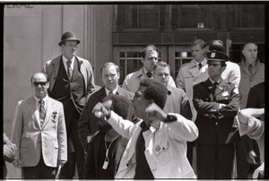May Day demonstrations and street actions by the Justice Department: African American protester exhorting the crowd