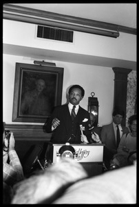 Jesse Jackson at the podium, addressing supporters